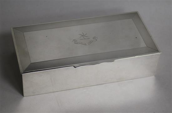 A George V silver cigarette box by Sampson Mordan & Co, London, 1930, 19.4cm.